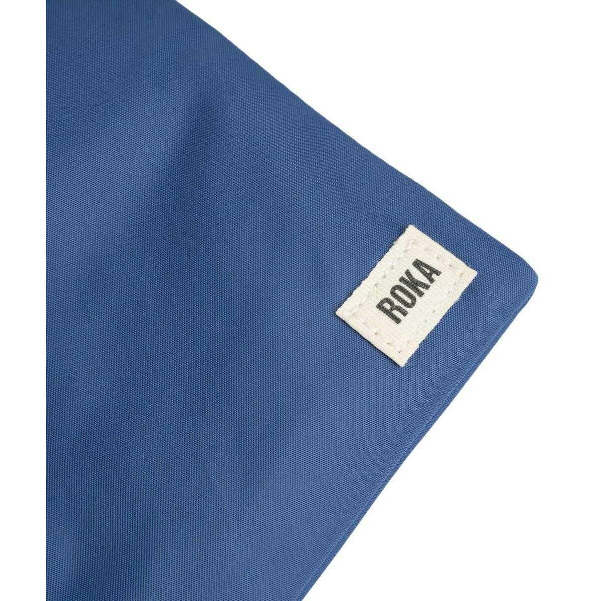 Roka Chelsea Sustainable Nylon Pocket Sling Bag - Burnt Blue - Image 6