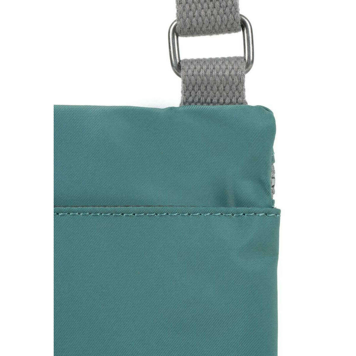 Roka Chelsea Sustainable Nylon Pocket Sling Bag - Sage Green - Image 5