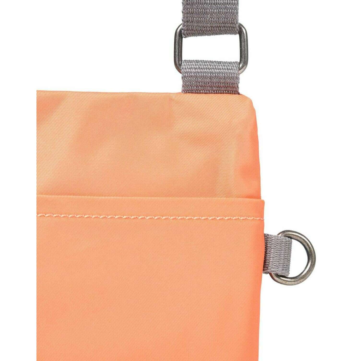 Roka Chelsea XS Recycled Nylon Pocket Sling Bag - Firecracker Orange - Image 5