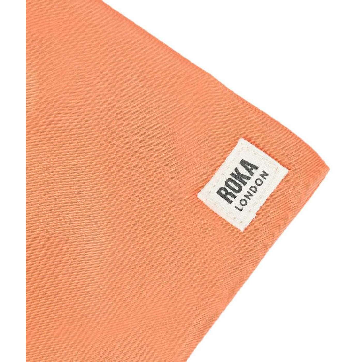 Roka Chelsea XS Recycled Nylon Pocket Sling Bag - Firecracker Orange - Image 6