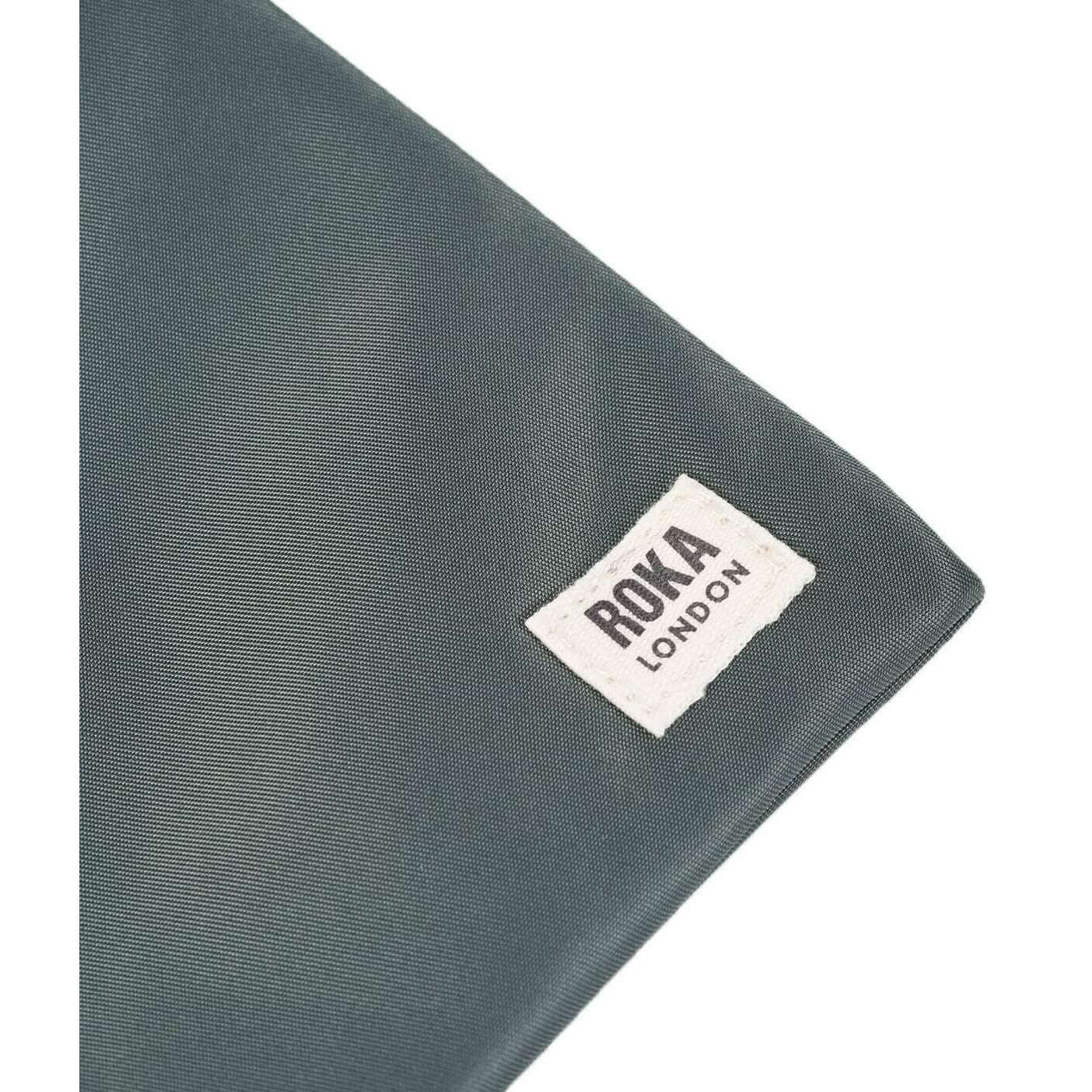 Roka Chelsea XS Recycled Nylon Pocket Sling Bag - Thyme Green - Image 6